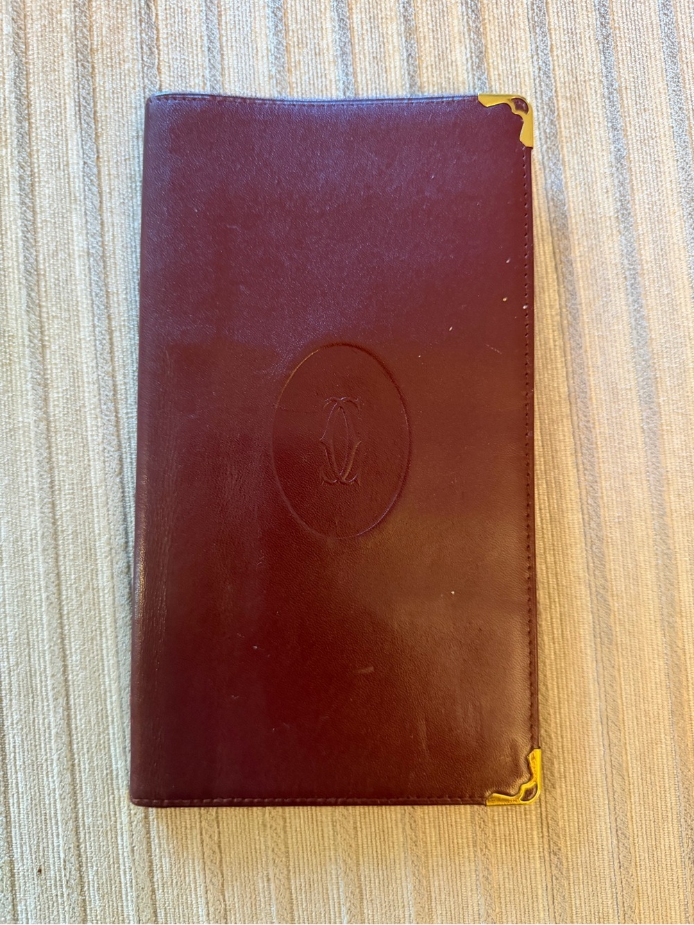 Cartier Burgundy Leather Long Wallet with Gold Corner Accents